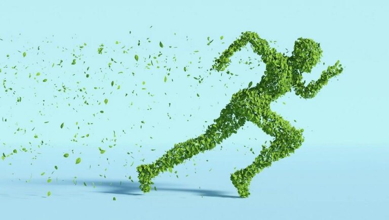 A running figure made of green leaves, symbolizing action and movement towards sustainability.