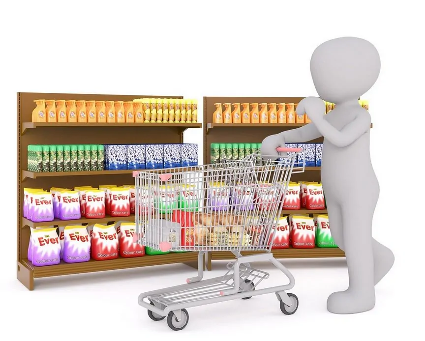 Shopping at the store with eco-friendly choices in mind, pushing a cart