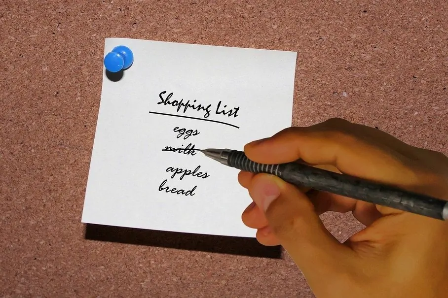 Making a sustainable shopping list with eco-conscious choices before heading to the store